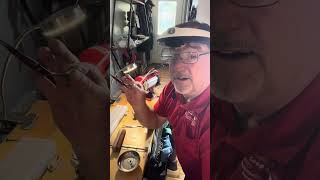 Sharpening curved scissors on a twice as sharp machine