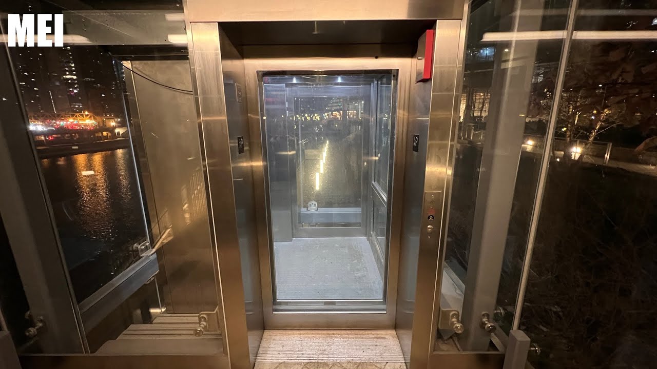 Glass MEI Hydraulic Elevator at Wolf Point in Chicago, IL