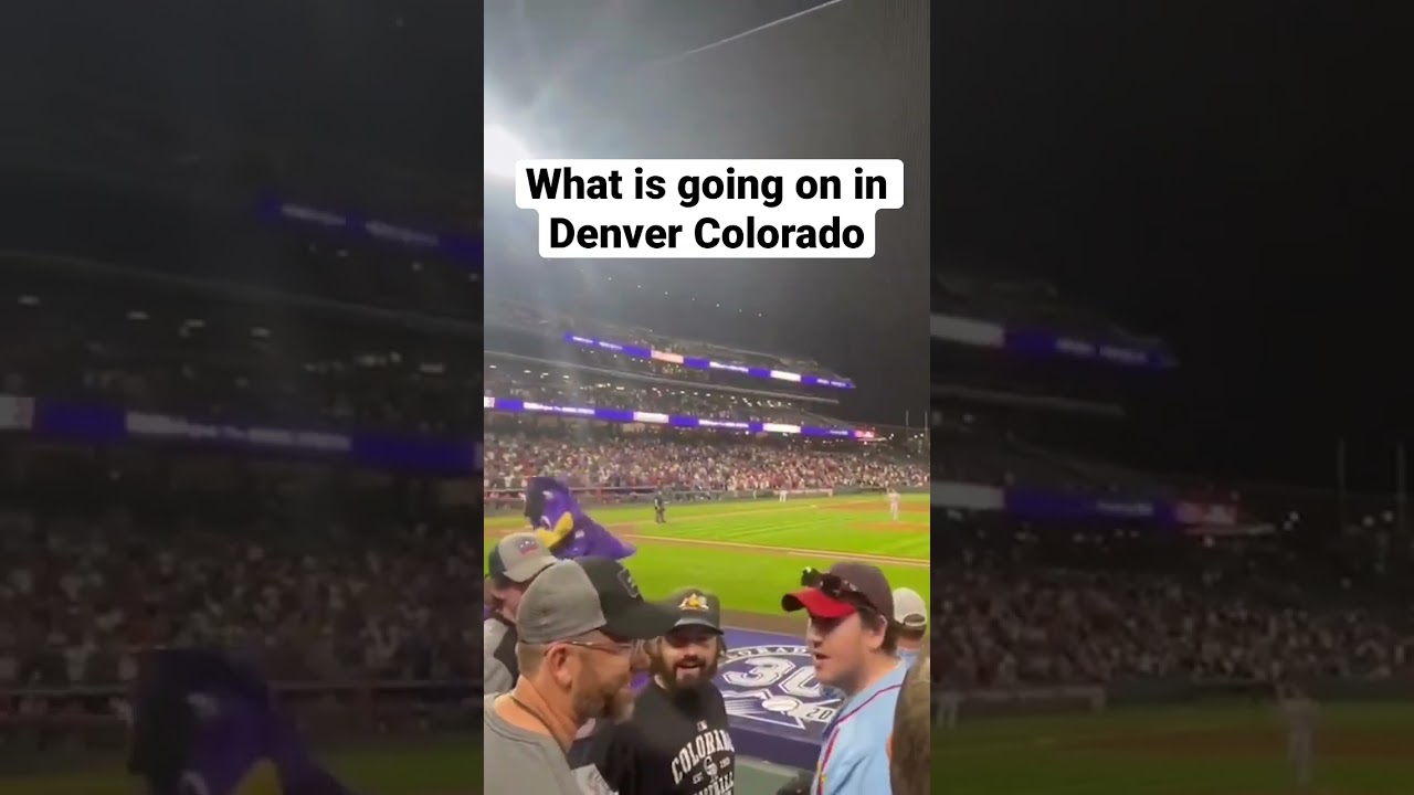 Colorado Rockies mascot Dinger gets tackled by fan