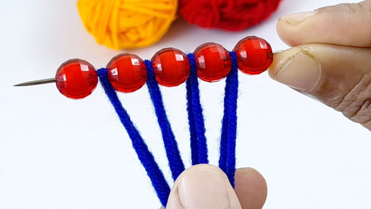 Amazing!! You'll love this super idea made of colorful beads and yarn