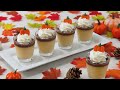 Creamy Pumpkin Panna Cotta with chocolate, whipped cream and pumpkin candy toppers