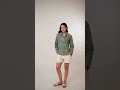Discover a unique twist on the classic button-down with this sage green wrap-style shirt. #handloom