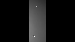 Helical motion of air bubbles rising in a water column