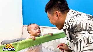 What method did Dad use to coax baby Kim into taking her first steps
