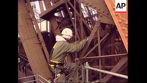 France - Painters Tackle Eiffel Tower