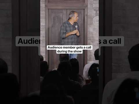 Audience member gets a call during the show