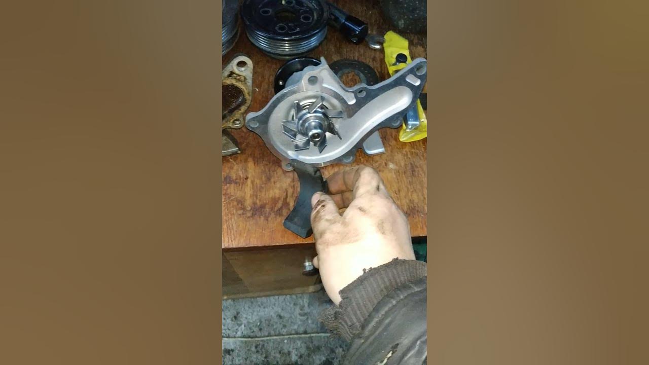замена помпы джили эмгранд ес7