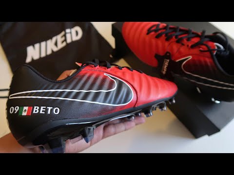 nike tiempo negro con dorado