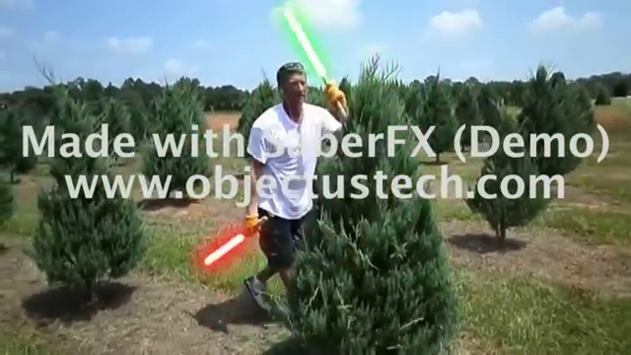 Trimming christmas trees with ribbon
