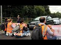 Protesters block several M25 junctions as police arrests at least 74 activists