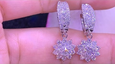 Bông tai xoàn tòn ten,hoa cúc.HK ý 750 gồm 2viên 3li6 D Vvs1 GIA ,24 viên 2 li2 64 viên 1 li2-1li8.