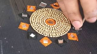 Unique chest piece design for a Kurthi top using beads and mirrors