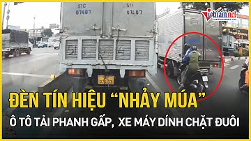 TPHCM: Xác minh đèn tín hiệu "nhảy múa", ô tô tải phanh gấp khiến xe máy dính chặt đuôi | VietNamNet