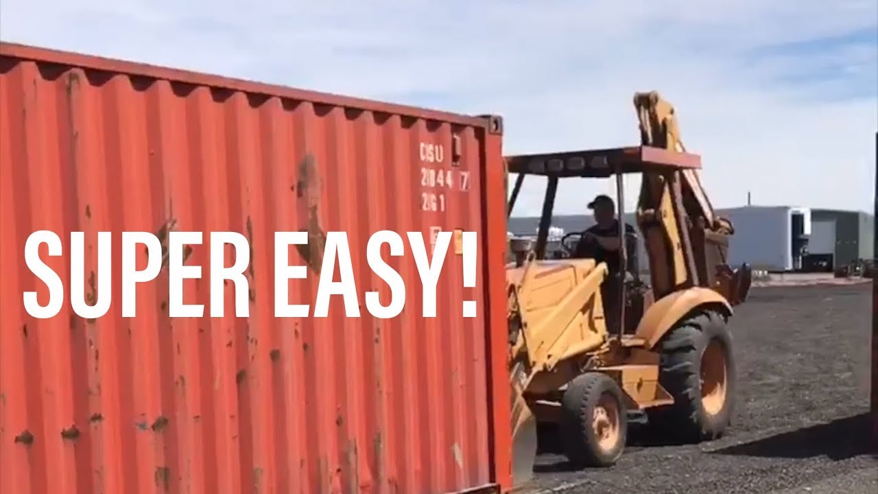 Moving Shipping Containers Around With A Backhoe Youtube