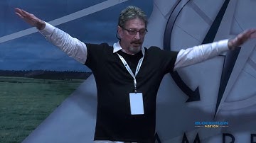 John McAfee at Blockchain Nation Miami 2018 bcnation.com