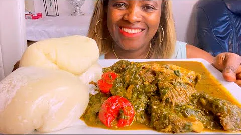 African food assorted +smoked chicken +vegetable soup with corn Fufu/eating show notalking