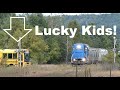 Lucky kids on a school bus stuck for a freight train trains   jason asselin