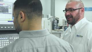 OKUMA and QualiChem - Partners in THINC