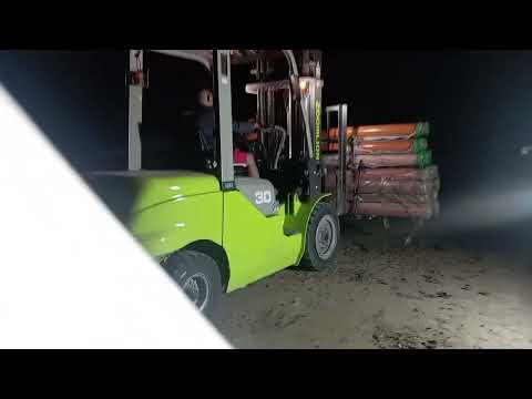 unloading forklift night shift