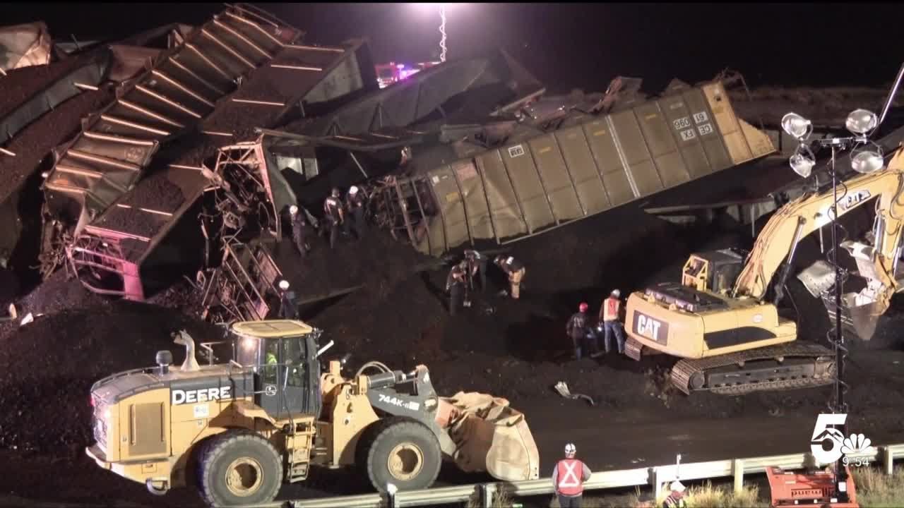 One dead as train derails onto I-25 north of Pueblo - YouTube