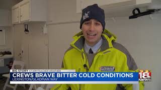 Crews Brave Bitter Cold Conditions