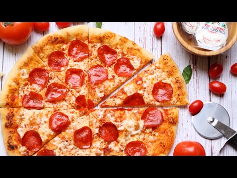 視頻: 一個 10 英寸的薄皮披薩含有多少卡路里？