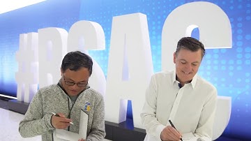 Ken Huang And Steve Wilson Sign Each Others