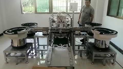 Fully automatic trousers pants hanger clip inserting assembly machine