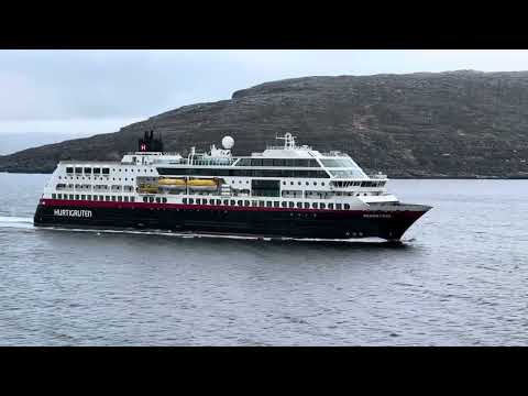 Midnatsol of Hurtigruten crosses the route of Havila Capella in Havoysund, Norway