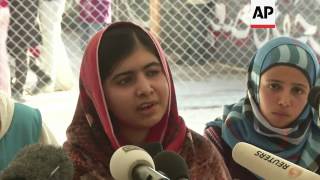Pakistani girl shot by Taliban visits children in camp for Syria refugees