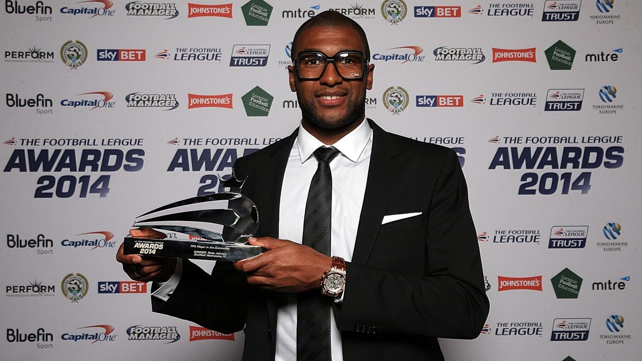 football score WINNER! Reda Johnson wins PFA Player in the Community award