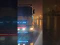 The Seaport is Raining and Driver on The Sea Cautch Goods from Ship to Countainer