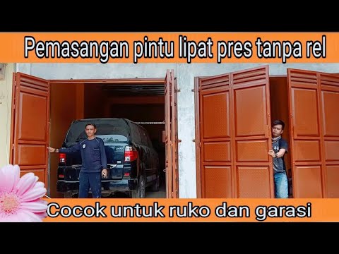 Pemasangan pintu  plat bodres lipat  tanpa  rel  l untuk 