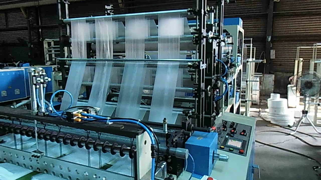 Plastic bag making machine - YouTube