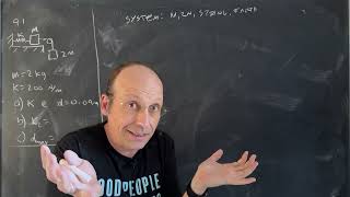 Physics Problem: Two Masses with a Spring and Gravity
