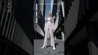 Shocking avant-garde fashion with crystal armor outfit – futuristic couture in urban architecture Shocking avant-garde fashion with crystal armor outfit – futuristic couture in urban architecture