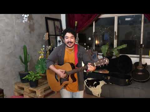Video tocando violão e cantando em inglês