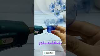 Aprenda uma linda flor suspensa de garrafa PET 🌺