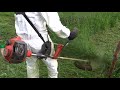 Sekn trvy kovinoezem  mowing the grass with a brushcutter
