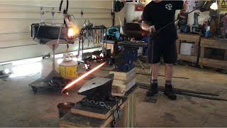 Forging shepherd hook plant hangers.