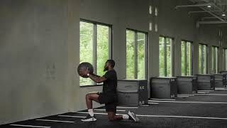 Half Kneeling Forward Facing Medicine Ball Hip Toss Rotating to Up Knee Exercise