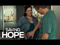 Who is the father of alexs baby  saving hope