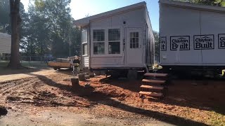 Double wide mobile home, setting and leveling
