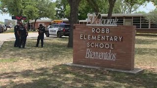 9 year old says he was hiding under a table during the mass shooting