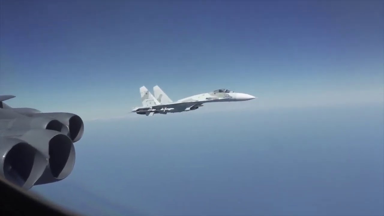 Russian Su-27 crosses in front of U.S. B-52 during intercept video