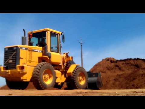 Operating front end loader - YouTube