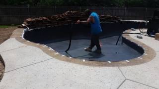 Baking the Ecofinish surface on the pool.