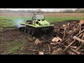 Cushman Trackster Playing on a Wood Pile