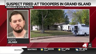 Charges filed against Grand Island man who fired at troopers