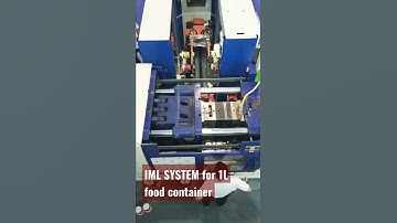 High speed side entry IML system for food container injection molding